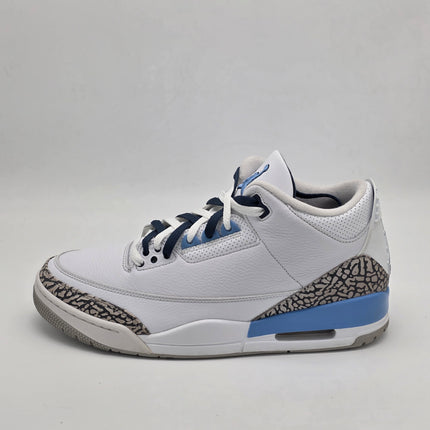 White sneaker with blue accents on a light gray background