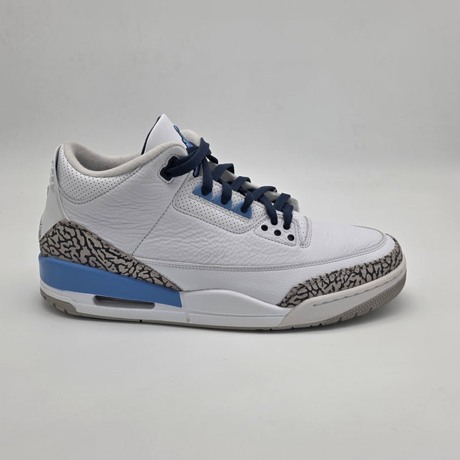 White sneaker with blue accents on a light gray background